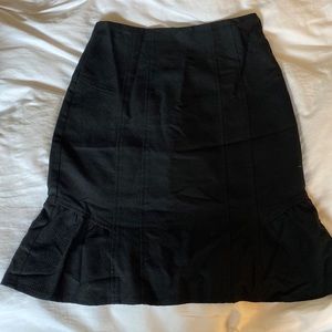 Nanette Lepore fit and flared black fluted skirt